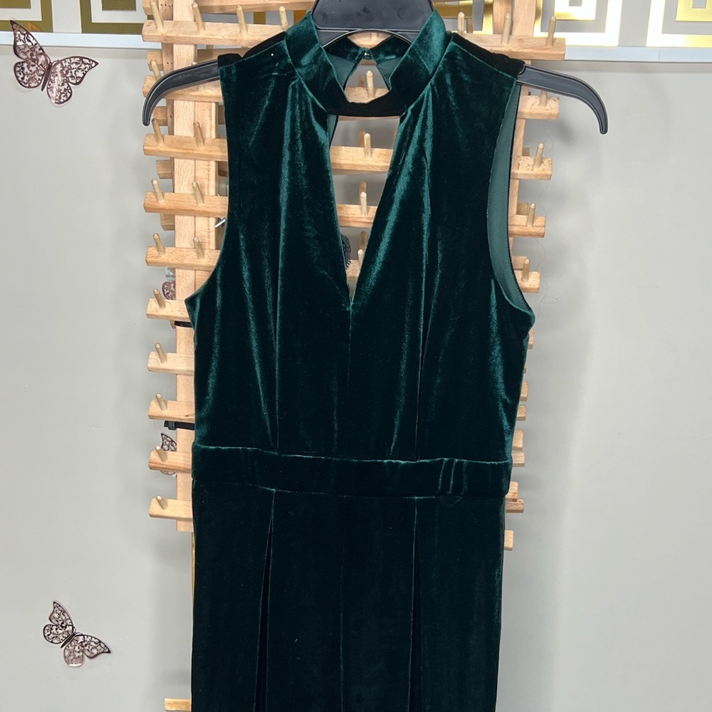 green jumpsuit